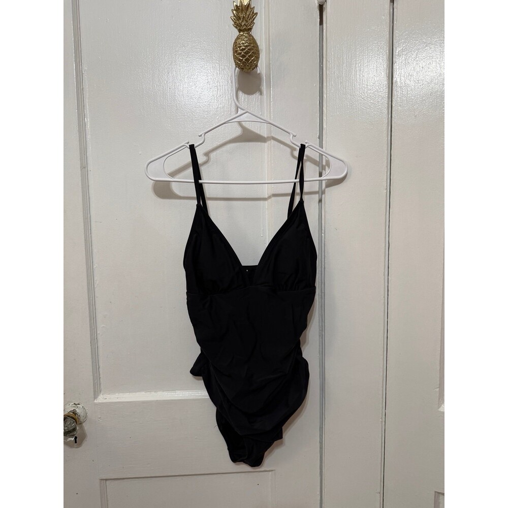 Women’s size medium, one piece, black bathing suit